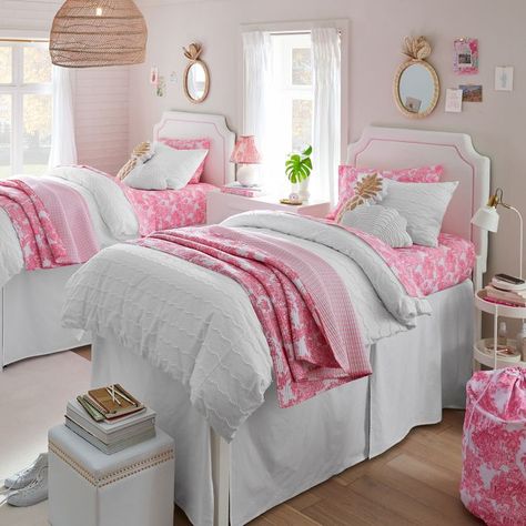 Charming and tropical, this quilt's toile design reveals pink palm trees swaying in the breeze. Tailored from pure cotton, the lightweight bedding offers natural softness and breathability for lasting comfort. Imagined exclusively for Pottery Barn Teen by Lilly Pulitzer, the iconic brand that started with a juice stand and a shift dress in Palm Beach and has been making people smile ever since with its vibrant hand-painted prints. By choosing our cotton products, you're supporting our investment in Better Cotton's mission. This product is sourced via mass balance and therefore may not contain Better Cotton. Learn more at bettercotton.org/massbalance OEKO-TEX(R) STANDARD 100: tested for 1000+ harmful substances to keep you and your family safe from chemicals common to textile manufacturing. Toile Quilt, Pink Dorm Room Decor, Pretty Dorm Room, Juice Stand, Pink Dorm Rooms, College Bedroom Apartment, Dream Dorm Room, Dorm Room Styles, Pink Dorm