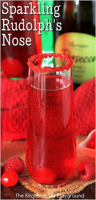 Sparkling Rudolph's Nose Christmas Cocktail ~ With its tasty combination, bright red hue, & adorable Rudolph's nose in the bottom of the glass, a Sparkling Rudolph's Nose is the perfect cocktail for Christmas! www.thekitchenismyplayground.com Rudolph Cocktail, Red Alcoholic Drinks, Gathering Recipes, Fruity Mixed Drinks, Christmas Drinks Alcohol, Red Drinks, Frozen Christmas, Cocktails Recipes, Christmas Foods