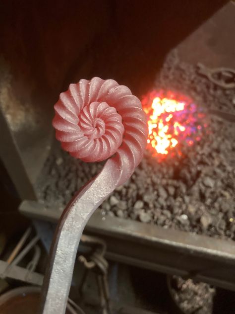 "This hand Forged Ammonite handed poker is individually made in my forge. Ammonite twists can be tricky to make requiring skill and patience to manipulate steel of varying heat and thickness. Even after years of practice no two are ever the same and each one will be unique in its own way. The shaft has a decorative twist with a forged diamond point on the business end. The length of the one shown is approximately 510mm (20\") but I can custom make them to almost any length up to 600mm (23\") Han Blacksmith Twists, Forged Metal Projects, Blacksmith Projects Ideas, Forging Ideas, Blacksmith Art, Diy Forge, Blacksmithing Projects, Blacksmith Ideas, Hand Forged Jewelry