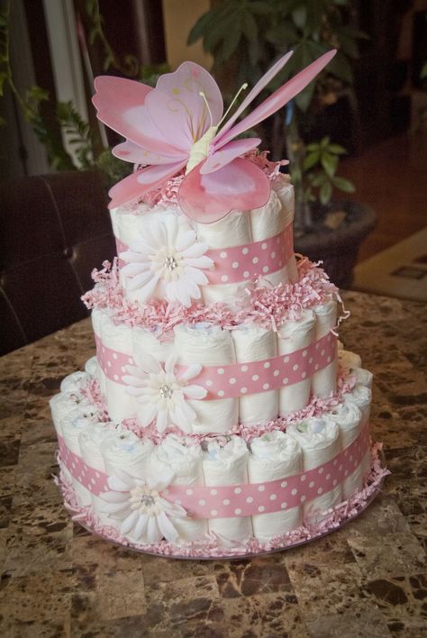 Nappy Cake Ideas Diy Girl, Pamper Cakes For Baby Showers, Diaper Cake Ideas Girl, Girl Diaper Cake Ideas, Nappies Cake, Creative Diaper Cakes, Nappy Cake Ideas, Diaper Cakes For Baby Girl, Simple Diaper Cake