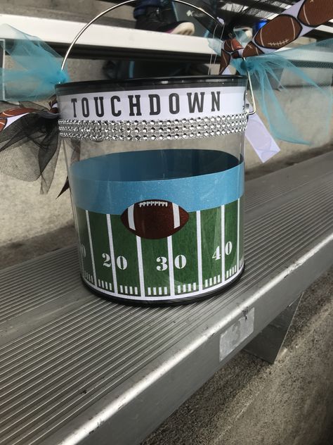 Football season touchdown buckets Donation Bucket Ideas, Fall Camp Basket Football, Athletic Booster Club Fundraising Ideas, Football Bucket Ideas, Booster Club Ideas, End Of Season Football Banquet, Football Team Mom Ideas, Touchdown Bucket Football, Pre-shrunk Football Season Sports Fan Shirt