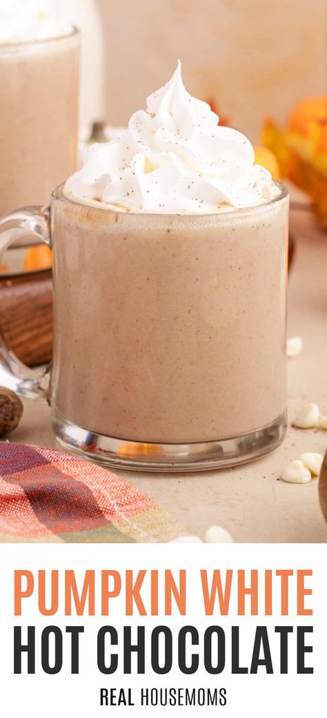 Stay cozy and warm this fall with homemade Pumpkin White Hot Chocolate, made with creamy pumpkin puree, sweet chocolate, and fall spices! #Realhousemoms #pumpkin #hotchocolate #creamy #pumpkinpuree #fallspices #fallweather #thanksgivingdrinks #hotdrinks #drinks #fall #thanksgiving #halloween Pumpkin Hot Chocolate Recipe, Pumpkin White Hot Chocolate, Pumpkin Drink Recipes, Pumpkin Hot Chocolate, Pumpkin Drinks, Thanksgiving Drinks, Hot Chocolate Drinks, White Hot Chocolate, Homemade Hot Chocolate