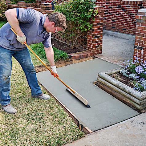 Sidewalk Diy Walkways, How To Make A Sidewalk, How To Pour Concrete, Pour Concrete Patio Diy, Diy Concrete Sidewalk, How To Pour Concrete Patio, Dry Pour Concrete Walkway, How To Pour Concrete Slab, Pouring Concrete Patio