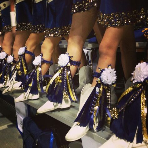 This is such a cute idea, but maybe not for a kick routine .. Senior Mums Homecoming Drill Team, Drill Team Boot Mum, Boot Mums Homecoming Drill Team, Drill Team Mums Homecoming, Hoco Mums, Texas Mums, Homecoming Mums Senior, Homecoming Spirit Week, Homecoming Corsage