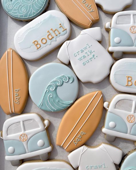 That onesie tho 💙 #babyshower #babyshowercookies #busybeesweet #longbeach #sugarcookies #decoratedcookies Beach Baby Shower Cookies, Baby On Board Cookies, The Big One Cookies, Surf Cookies, Baby On Board Baby Shower Ideas, Surfboard Cookies, Surfer Baby Shower, Royal Cookies, Surfer Baby