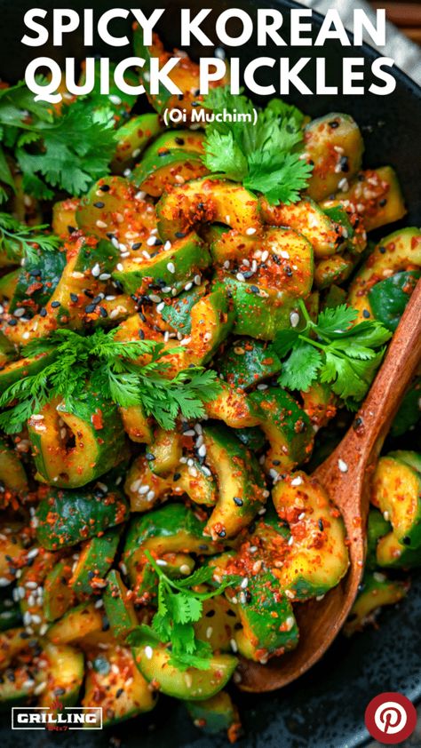 spicy Korean cucumbers in a black bowl with a wooden spoon Asian Pickled Vegetables, Korean Cucumbers, Korean Pickles, Oi Muchim, Homemade Staples, Side Dishes For Ham, Side Dishes For Salmon, Local Supermarket, Korean Kitchen