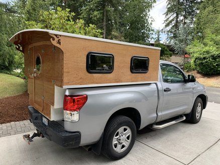 The New Plywood Camper Wood Truck Camper, Truck Cap Camping, Diy Truck Camper, Diy Slide, Camper Steps, Truck House, Truck Canopy, Slide In Truck Campers, Camping Trailer Diy