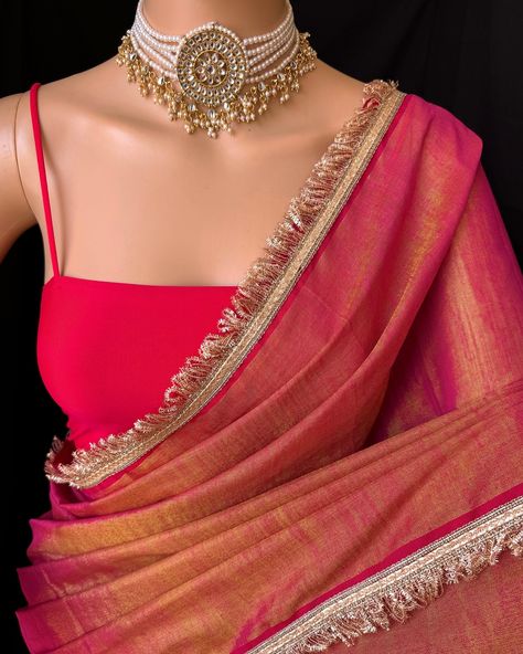 Pink gold tissue saree with contrast golden lace all over sarees. Comes with beautiful red thread tassels on pallu. Blouse: running blouse 80cm. To find this product in website: Www.thejacouture.in > Tissue sarees> pink Gold tissue saree. Jewellery collaboration: @anvi__jewellery #mettalictissuesaree #tissuesaree #trendingsaree #tissuelacesaree #traditional #pinktissuesaree Golden Saree With Contrast Blouse, Pink Saree Contrast Blouse, Pink Tissue Saree, Gold Tissue Saree, Saree Contrast Blouse, Tissue Sarees, Thread Tassels, Golden Saree, Blouses Designs