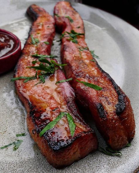 NOW you're BACON me happy!! Who’s in for a lovely slice?? 😋 🥓 🥓 📷 @omgitsbomb Tudor City Steakhouse . 🥓🐷 If you bring home the bacon in the household make sure you visit @tudorcitysteakhouse for this THICCCC CUT BACON! #OMGitsbomb #bombdotcom 🐷🐷🐷🐷🐷 🥓 🥓 #omgitsbomb #buzzfeedfood #eattheworld #instayum #myfab5 #grillaholic #breakfast #outdoorcooking #🥓 #breakfastgoals #breakfasttime #bbq #pork #frühstück #bbqfamily #breakfastlover #bacon #baconlovers Thick Bacon, Bacon Steak, Beef Bacon, Breakfast Restaurants, Thick Cut Bacon, Tenderloin Recipes, Comfort Food Recipes Dinners, Food Babe, Pork Tenderloin Recipes