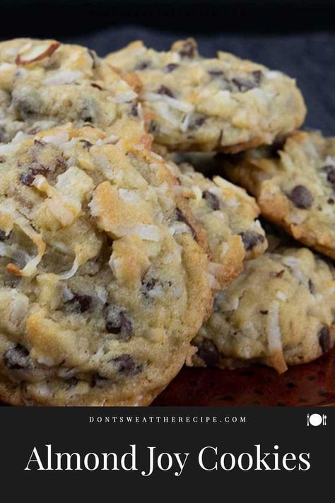 Almond Joy cookies are a blend of sweet coconut, semi-sweet chocolate chips, and sliced almonds. A delicious twist on your favorite candy bar! Candy Bar Cookies, Joy Cookies, Almond Joy Cookies, A Glass Of Milk, Chocolate Crinkle Cookies, Coconut Chocolate, Creative Baking, Coconut Almond, Almond Joy