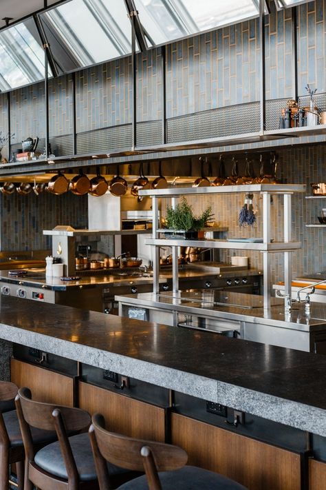 an open kitchen with a counter lined with stools Open Kitchen Bar Design, Open Kitchen Design Restaurant, Open Kitchen Restaurant Design, Open Kitchen Cafe, Open Kitchen Bar, Kitchen Restaurant Design, Open Kitchen Restaurant, Restaurant Kitchen Design, Commercial Kitchen Design