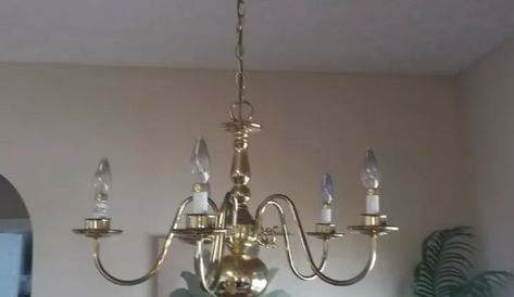 Do you have an old dining room light fixture in need of an update? Why not check out my elegant and sparkly before and after DIY? New crystal chandeliers can be hundreds, if not thousands, of dollars and that was definitely not in the budget. However, with a little bit of creativity, my old, boring brass chandelier got a dramatic and glamorous makeover for a fraction of the cost. It’s hard to believe it’s the same light fixture.  Supplies: Two Large Embroidery Hoops Fabric… Old Dining Room, Chandelier Makeover, Drum Shade Chandelier, Diy Stained Glass Window, Antique Brass Chandelier, Dining Room Light Fixture, Large Embroidery, Diy Staining, Dining Room Light