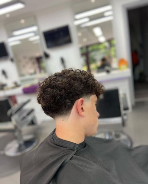 Tapper Fade Men Haircut Curly Hair, Blowout Taper Men Wavy Hair, Low Taper Back, Skin Taper Fade Men, Taper Fade Haircut Wavy Hair, Mid Taper Haircut Men, Low Taper Fade Haircut Wavy Hair, Low Taper Fade Fluffy Hair, Curly Hair Men Haircut Taper