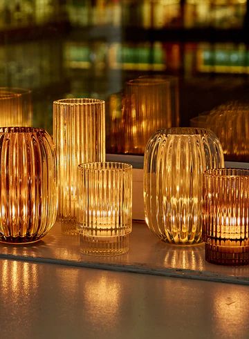 Optical Glass Votive Holder | Votive Holders | Serene Spaces Living Amber Glass Wedding, Wedding Votives, Small Led Lights, Amber Candle, Glass Votive Candle Holders, Glass Votive Holders, Glass Tea Light Holders, Candle Table, Ribbed Glass