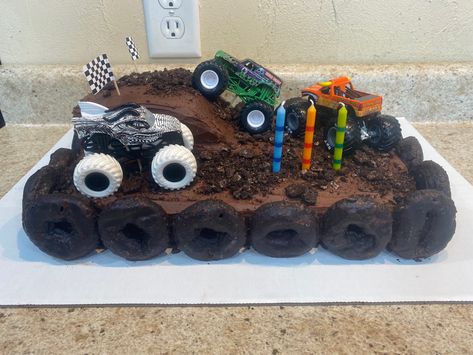 Monster Truck Track Cake, Monster Truck Pretzel Rods, Mini Monster Truck Cake, Monster Jam Cake Diy, Grave Digger Cake Pops, Diy Monster Jam Cake, Monster Truck Bday Cake, Monster Truck Dirt Cake, Monster Truck 3rd Birthday Cake