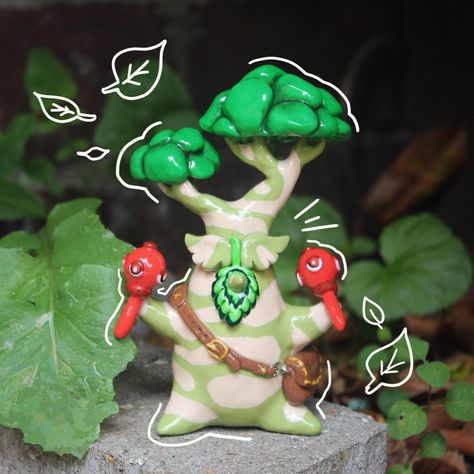 While I'm still catching up on life and custom orders here's a proper photo of the Hestu I finished a week ago, and who is now sitting happily in his new home with a lovely customer of mine 💕 . . . #zelda #zeldabreathofthewild #zeldafanart #zeldabotw #thelegendofzelda #botw #totk #breathofthewild #tearsofthekingdom #fanart #hestu #korok #sculpture #polymerclay #polymerclayartist #polymerclaycreations #art #artist #gaming #gamer #gameart #nintendo #smallbusiness #etsyseller Hestu Korok, Korok Zelda, Posca Pens, Clay Figures, Polymer Clay Creations, Breath Of The Wild, Uv Resin, Handmade Polymer Clay, Legend Of Zelda