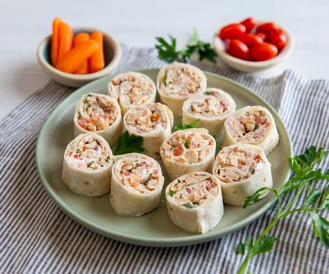 These tasty rolls are simple to make and easy to enjoy — the ultimate party snack. Salmon Tortilla, Tortilla Ideas, Red Velvet Bars, 2023 Meals, Salmon Pinwheels, Appetizer Wraps, Salmon Wrap, Salmon Appetizer, Chicken Of The Sea