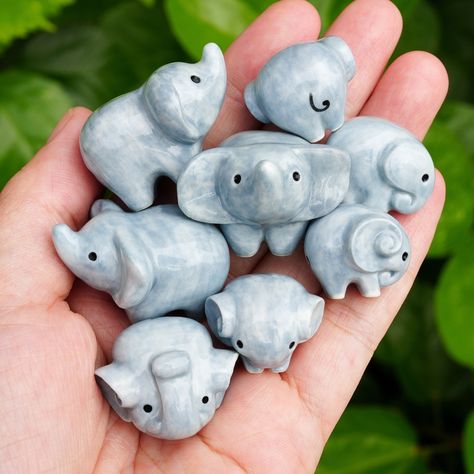 "A tiny ceramic elephant figurine This elephant is crafted from fine porcelain, and meticulously hand painted in detail with great quality, highly collectible. He is the perfect for any miniature collector or elephant lover. Dimensions -- TINY GREY ELEPHANT FIGURINE: 0.7\" (1.8 cm) - 0.75\" (1.9 cm) -- TINY GREY ELEPHANT NECKLACE: Each charm is about 0.7\" (1.8 cm) - 0.75\" (1.9 cm) Chains are custom in 14 - 18 inches. -- Materials-- Pendant: Porcelain Clay, High Glaze The chain is made of high Miniature Clay Art, Polymer Clay Elephant, Elephant Ceramics, Baby Elefant, Ceramic Elephant, Elephant Lover, Grey Elephant, Elephant Necklace, Clay Figurine