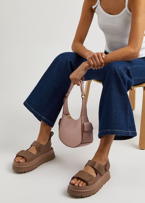 7 Spring Outfit Ideas for the Early May Bank Holiday Weekend 2024. | Who What Wear UK Uggs Sandals Outfit, Ugg Sandals Outfit Ideas, Ugg Sandals Outfit, Ugg Sandals, Sandals Outfit, Rubber Sandals, Debossed Logo, Bank Holiday Weekend, Golden Glow