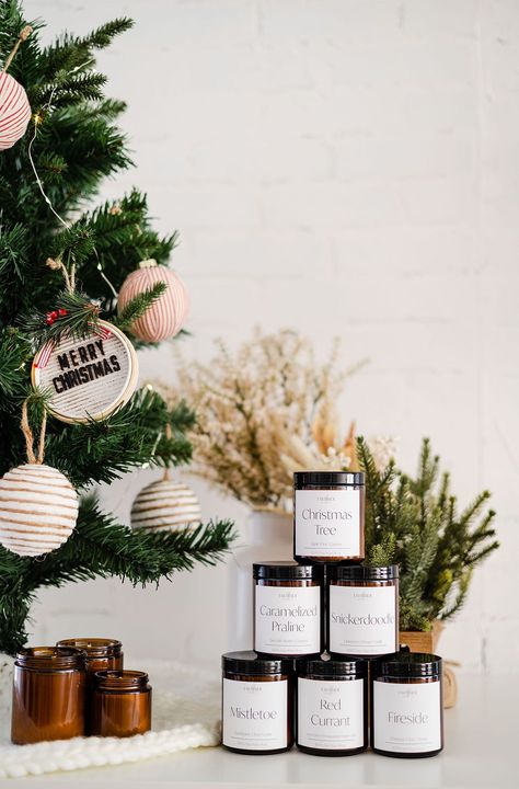 In today's blog post, I'm showcasing Earthside Candle Co's holiday and Christmas product photoshoot! Read on to see our studio setup & props. | Emily Kim Photography | christmas product photography, christmas product photoshoot, christmas product photography styling, christmas product photography ideas, christmas product shoot, candle photography, candle photography ideas, candle photography inspiration Christmas Photoshoot Ideas For Products, Christmas Packaging Photography, Ornament Product Photography, Christmas Candle Photography Ideas, Christmas Tree Product Photography, Christmas Candles Photography, Christmas Candle Shoot, Holiday Shoot Ideas, Christmas Ornaments Photography