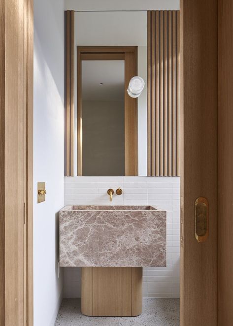 The powder room features a custom stone sink with a white oak base built by the homeowner. #dwell #homerenovations #toronto #moderndesign Bathroom Vanity Designs, 1920s House, Stone Counters, Interior Design Consultation, Vanity Design, Stone Sink, Chic Bathrooms, Bathroom Inspiration, Bathroom Interior Design