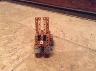 Minecraft Perler Bead Rabbit : 7 Steps - Instructables Minecraft Pig, 3d Perler Bead, Rabbit Head, Melty Beads, Bead Ideas, Minecraft Ideas, 3d Puzzles, Perler Beads Designs, Build Something