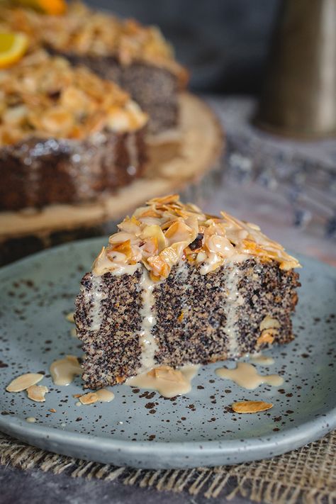 Are you looking for a tasty holiday cake? This orange almond poppy seed cake is deliciously moist with a luscious caramel sauce topping. Even better, the cake is naturally gluten free so everyone can have a slice. #orange #almond #poppyseed #cake Paleo Poppyseed Cake, Recipe With Poppy Seeds, Gluten Free Poppy Seed Cake, Poppy Seed Baking, Poppy Seed Recipes Healthy, Orange Almond Poppy Seed Cake, Polish Poppy Seed Cake, Poppy Seed Dessert Recipes, Poppyseed Dessert Recipes