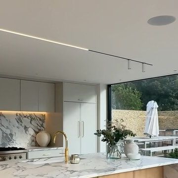 The Luxury Home Show on Instagram: "A look at this beautiful light-filled kitchen with its open-plan layout @project_castle_combe 🪵 The standout feature is the gorgeous marble waterfall island, imagine waking up every day to enjoy breakfast with a view of the garden and pool… it’s a dream come true! • • #luxurylifestyle #luxuryhomes #luxuryhouses #luxuryhomesuk #housetours #theluxuryhomeshow #homeinsporation #homedesign #londonhomes #interiorsuk #housetours #wiltshire #wiltshirelife #wiltshirehome #cotswolds" Kitchen With Pool View, Marble Waterfall Island, Breakfast With A View, Waterfall Island, Castle Combe, Pool View, Plan Layout, January 15, A Dream Come True