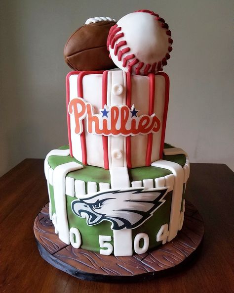 Philadelphia Phillies and eagles groom's cake. #groomscake #philliescake #eaglescake #malebirthdaycake #birthdaycake #philadelphiaphillies #philadelpiaeagles #fondantcake #Philadelphia Philadelphia Sports Cake, Philly Sports Cake, Phillies Birthday Cake, Phillies Birthday Party Ideas, Phillies Birthday Party, Philly Eagles Cake, Eagles Birthday Cake, Phillies Cake, Philadelphia Eagles Cake