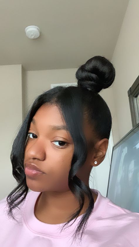 Top Knot On Natural Hair, Top Knot Bun Black Women Weave, Top Knot With Curls, 2 Buns With Bangs Black Women, Top Not Bun With Bangs, Topknot Bun With Bangs, Top Knot Bun With Braiding Hair Weave, Side Bangs With Bun Black Women, High Bun With Bangs Natural Hair