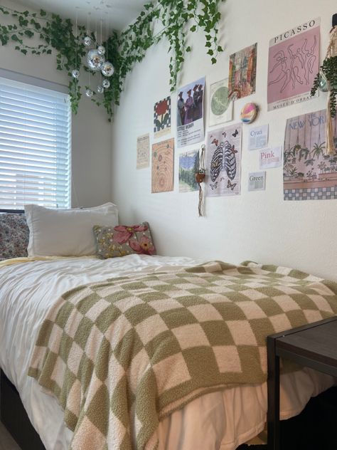 Green checkered, floral bedding, floral sheets, poster wall, disco ball corner, posters, pastel dorm room Plain Dorm Room, Dorm Room Poster Ideas, College Dorm Poster Wall, Pastel College Dorm, Dorm Room Poster Wall, Dorm Room Poster, Pastel Dorm Room Aesthetic, Dorm Room Pink And Green, Dorm Bedding Ideas Color Schemes