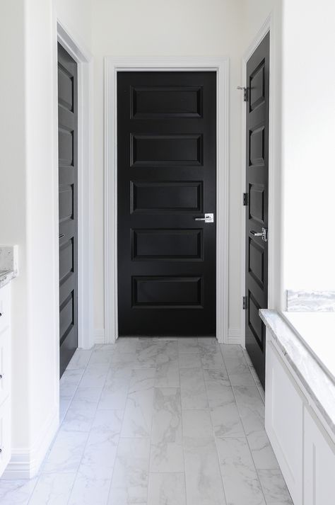 Black interior doors in a gorgeous satin finish look sleek when paired with minimal decor and alabaster white walls. Black Gloss Interior Doors, Black Interior Doors Dark Floors, Inside Doors Painted Black, Paint Indoor Doors Black, Flat Interior Doors Painted Black, Black Interrior Doors, Black Doors Interior, Paint Doors Black, White Interior Doors