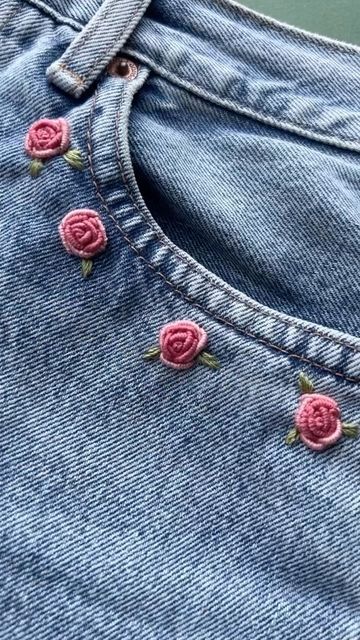 Jenny ~ Embroidery Art, Design & Crafts on Instagram: "Roses 💐 pretty don’t you think! 😊 these are made up of bullion knots. . . #bullionknots #bullionknot #upcycledclothing #upcycledfashion #knitwear #embroideredclothing #embroidereddenim #embroideredclothes #embroideredflorals #learntoembroider #mindfulart #slowstitching #sewingproject #embroiderypatterns #bordadolivre #createdtocreate #diycrafts #slowcraft #dmcthreads #dmcembroidery #springflowers #embroiderydesign #beginnerembroidery #embroiderywork #denimembroidery #sustainablefashion #embroiderhappyhoops #embroiderytutorial #embroideryprocess" Jean Pocket Embroidery, Customised Jeans, Bullion Knot, Skirt Embroidery, Embroidery Jeans Diy, Embroider Ideas, Embroidery Hoop Art Diy, Clothes Embroidery Diy, Instagram Roses