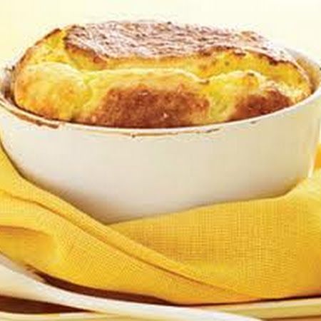 Mrs. Ralph Izard's Awendaw - Southern Living Magazine - A creamy, richly flavored fusion of grits and spoonbread with a soufflé-like texture. Grits Souffle, Spoon Bread, Smoked Gouda Cheese, Souffle Recipes, A Loaf Of Bread, Loaf Of Bread, Vegetarian Breakfast, Cereal Recipes, Grits