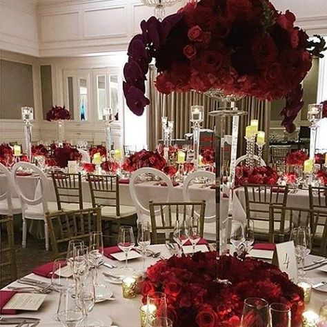 Striking red and white tablescape beauty with @lourdesmilian. Love the red orchid and rose blend. #LourdesMilian #red #redwedding #redweddingdecor #weddingdecor #weddingflowers #weddingtables #centerpieces #floral #flowers #redroses #roses #orchids #getti Flower Centrepiece Wedding, Centrepiece Wedding, Wedding Flower Decor, Rose Blend, Flower Centrepiece, White Tablescape, Red Orchid, Centerpieces Floral, Wedding Centrepiece