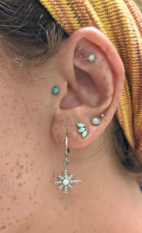 Silver And Opal Ear Piercings, Opal Curated Ear, Ear Inspiration Piercing Silver, Opal Ear Styling, Colorful Ear Curation, Earrings Stack Aesthetic, Ear Styling Ideas Silver, Opal Piercing Ears, Curated Ear Silver