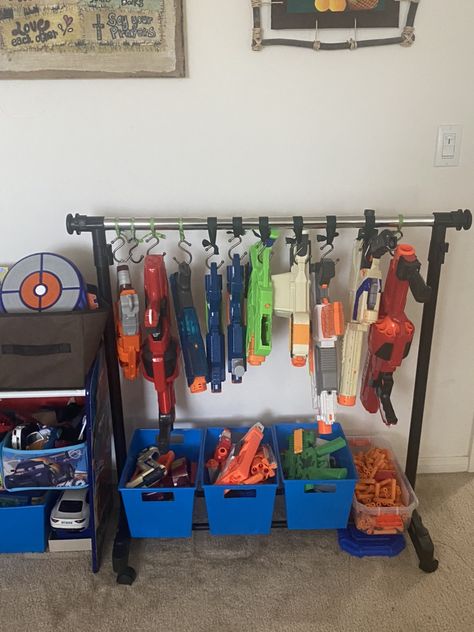 Teen Boy Toy Storage, Big Truck Storage Kids Rooms, Big Toy Organization Ideas, Nerf Closet Storage, Storing Big Toys, How To Store Big Toys, Nerf Wall Boy Rooms, Toy Room Ideas For Boys, Boys Bedroom Organization Ideas