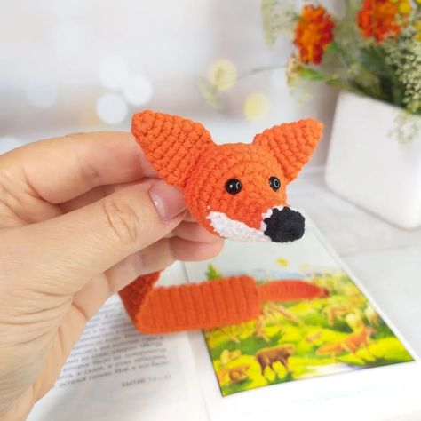 Just in time for International Crochet Day, I’ve finished this cute fox bookmark! 🦊🍂 What projects are you working on to celebrate? 🍁🍁🍁🍂🍁🍁🍁🍂🍁🍁🍁 International Crochet Day, crochet bookmark pattern, fall crochet, fox crochet, amigurumi fox pattern @fainacutetoys #fallcrochet #internationalcrochetday #amigurumicrochet #crochetfox #crochetbookmark Fox Bookmark, Amigurumi Fox Pattern, Fox Crochet, Bookmark Pattern, Crochet Bookmark Pattern, Crochet Bookmark, Amigurumi Fox, Fall Crochet, Fox Tail