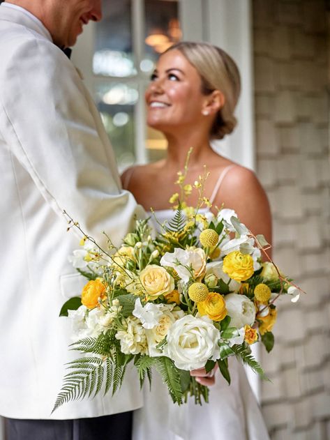 "I knew I wanted yellow flowers because it's my favorite color," says the bride of her canary and butter yellow floral theme by Floressence Flowers. Additionally, white blooms and hints of green offset the bolder color. Light Yellow Weddings, Yellow White Wedding, Southern Traditions, Yellow Wedding Bouquet, Highlands North Carolina, Yellow Wedding Theme, Green Wedding Flowers, Highlands Nc, Yellow Bouquets