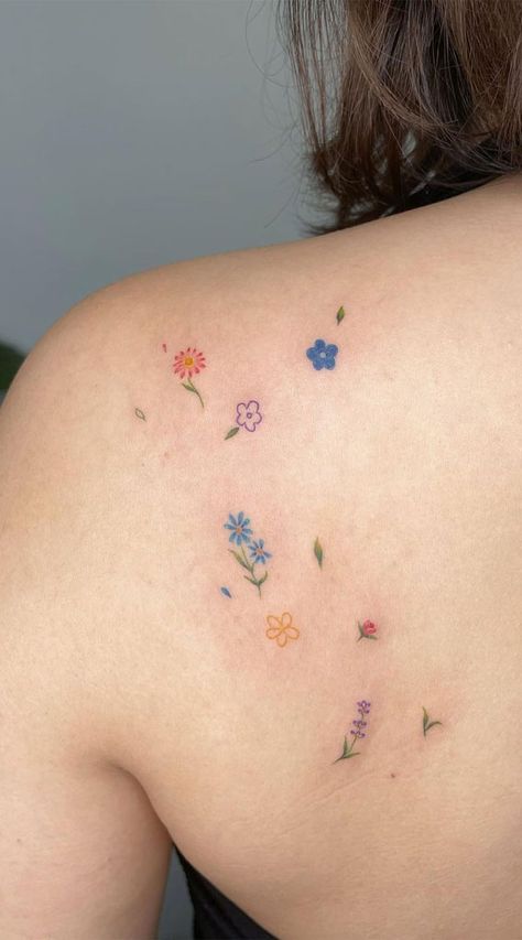 Small Tattoo Ideas, Simple Tattoos, finger tattoos, simple tattoo ideas, cute tattoo ideas, butterfly tattoos, dainty tattoos, tiny tattoo ideas, small meaningful tattoos Wedding Flower Tattoo Ideas, Color In Tattoos, Small Color Flower Tattoo Simple, Colorful Tattoos For Women Small, Colorful Flower Tattoo Small, Interactive Tattoo Ideas, Flower Tattoos Tiny, Small Flower Cluster Tattoo, Colour Finger Tattoo