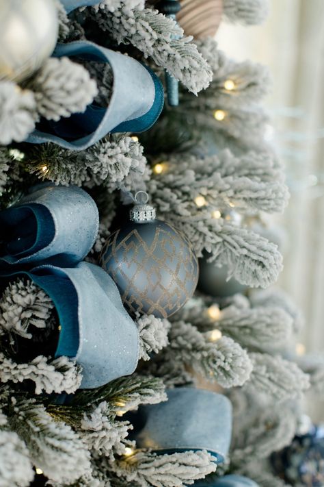 Peacock blue and dark blue layered ribbon on pre lit flocked white Christmas tree. Blue Christmas Tree Decorations, Flocked Tree, Blue Christmas Decor, Silver Christmas Decorations, Blue Christmas Tree, Silver Christmas Tree, Gold Christmas Decorations, Flocked Christmas Trees, Ribbon On Christmas Tree