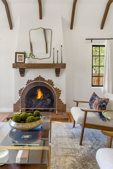 Old California Interior Design, California Spanish Bungalow Interior, Modern Spanish Fireplace Ideas, Modern Spanish Coastal Style Homes, Spanish Style Mantle, Southwestern Fireplace Ideas, Spanish Style Tile Fireplace, Mexican Style Fireplace, California Mission Style Interiors