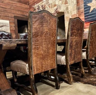 Dining Tables and Chairs | Bison Creek Western Dining Room, Rustic Dining Tables, Whiskey Lounge, Dining Tables And Chairs, Cattle Brands, Dining Table Rustic, Chair And A Half, Tables And Chairs, Lodge Decor