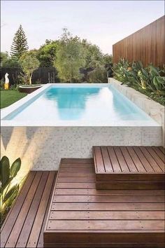 Terraced Patio Ideas, Raised Pools, Kleiner Pool Design, Pool Landscape Design, Above Ground Pool Landscaping, Small Pool Design, Above Ground Pool Decks, White Mosaic, Backyard Pool Landscaping