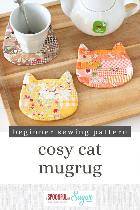 Make snack time fun with this cute cosy cat coaster – perfect for cat lovers everywhere! Featuring a monochromatic scrappy strip patchwork cat, they are purrfectly sized to hold a glass or coffee cup. The Cosy Cat Coaster can be easily made in an afternoon and is a fun way to use your favourite fabric offcuts. Be warned – it is hard to stop at one – you will soon have a clowder of cats on hand when entertaining. Sewing Mug Rugs, Mug Rug Tutorials, Handmade Coasters Fabric, Scrappy Mug Rug, Easy Mug Rugs Patterns Free How To Make, Cat Mug Rugs Patterns Free, How To Sew Coasters, Diy Mug Rug, Mug Rug Ideas