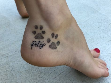 Tattoo Ideas Paws Dog Prints, Paw Print Tattoo Ankle, Dog Paw Tattoo On Ankle, Multiple Dog Paw Print Tattoo, Ankle Pet Tattoo, Actual Paw Print Tattoo, Tropical Tattoo, Dog Memorial Tattoos, Pawprint Tattoo