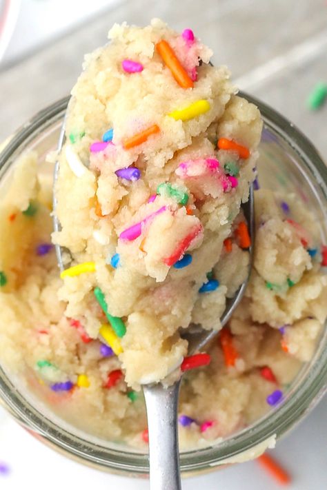 This single-serve edible sugar cookie dough recipe is the best no-bake treat whenever you need a quick and easy dessert. Made with 5 ingredients and no brown sugar, the dough mixes together in 5 minutes and has a delicious sugar cookie flavor. Mix in your favorite sprinkles and enjoy this safe-to-eat cookie dough treat! Sugar cookie dough requires no baking to satisfy all of your cookie cravings. There’s something about the soft and chewy sweetness of homemade cookie dough that’s irresistible! Edible Sugar Cookie Dough Recipe, Edible Cookie Dough Bites, Cookie Dough For One, Edible Sugar Cookie Dough, Sugar Cookie Dough Recipe, Homemade Cookie Dough, Cookie Dough To Eat, Edible Cookie Dough Recipe, No Bake Cookie Dough