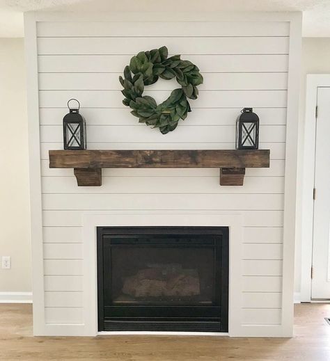 My husband and I recently fixed up a house. We wanted to added something fun to the living room to make it more attractive. So, we decided to shiplap the fireplace and add a wood mantel. I am so glad we did it. I think it helped resell the house, that’s what we got the most compliments on after we finished everything. The shiplap was from Lowe’s and the wood mantel was from amazon. I picked an unfinished mantel so I could choose the stain in person. I began by staining the bottom of t… Magnolia Homes Living Room, Diy Shiplap Fireplace, Living Room Mantle, Faux Fireplace Diy, Minimalist Living Room Decor, Brick Fireplace Makeover, Shiplap Fireplace, The Mantle, Diy Shiplap