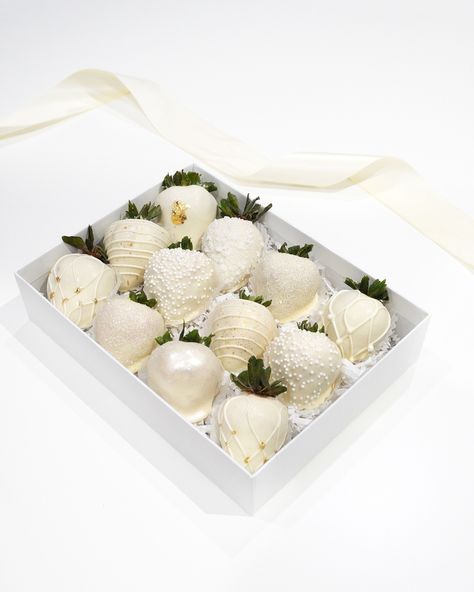 Simply Divine Delights 🍫🍓 All white chocolate with fine gold and pearl toppings ✨ Perfect pairing for a bridal or wedding party! 💍 . . . #vancouver #vancouvereats #vancouvertreats #yvreats #vancouverfoodie #vancityfoodie #chocolatecoveredstrawberries #yvrstrawberries #yvrsweets #giftideas #vancouvergifts #dippedstrawberries #dippedfruit #chocoberries Wedding Dipped Strawberries, Black And White Chocolate Strawberries, Chocolate Covered Strawberries For Wedding, White And Gold Chocolate Strawberries, White Covered Strawberries, Wedding Chocolates, Chocolate Business, White Chocolate Covered Strawberries, Chocolate Covered Desserts