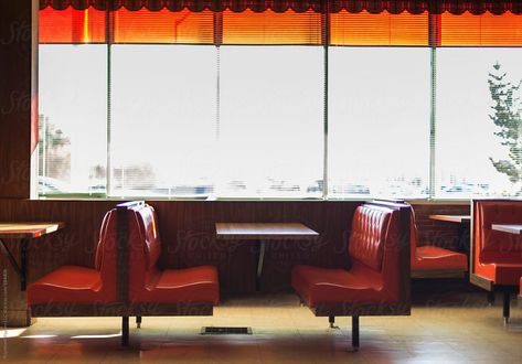 Diner booth in American Restuarant | Stocksy United by Raymond Forbes Photography #stockphoto #diner #dinerbooth #red #americana #usaroadtrip #restaurant #window Diner Interior, Booth Aesthetic, Cinematic Inspiration, Red Americana, Vintage Photography Inspiration, Restaurant Window, Diner Booth, Diner Aesthetic, American Cafe